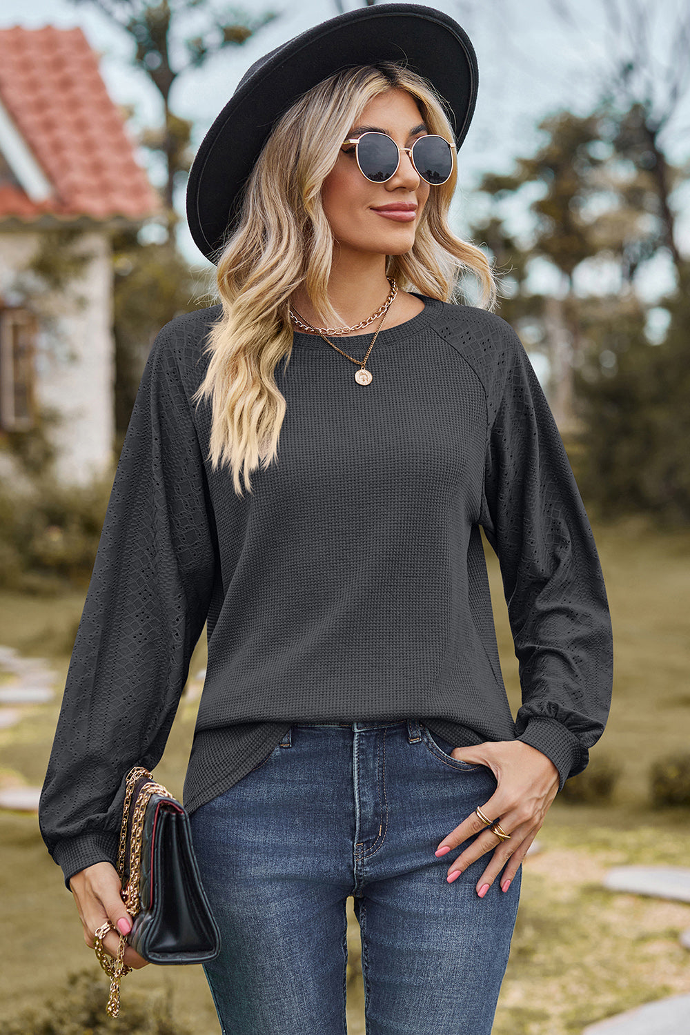 Dark Gray waffle knit eyelet raglan sleeve top with crew neck and balloon sleeves