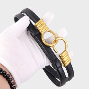 Black cowhide leather skinny belt with gold hardware detail