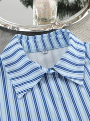 Light blue and navy striped button-up pajama shirt with a classic collar.
