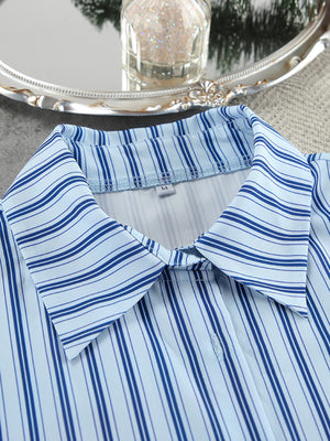 Light blue and navy striped button-up pajama shirt with a classic collar.