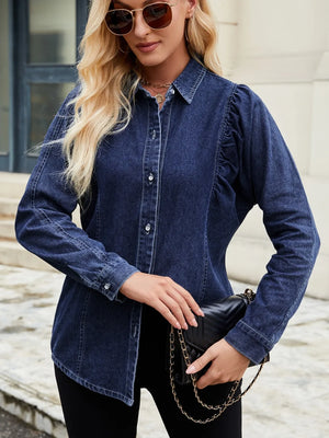Dark blue denim blouse with ruffled puff sleeves and button front.