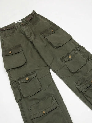 Dark green cargo pants with multiple buttoned pockets and a belt.