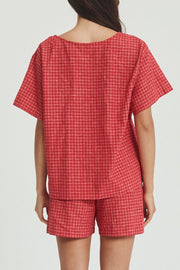 Open-front cotton plaid top and shorts set in deep red, shown from the back.