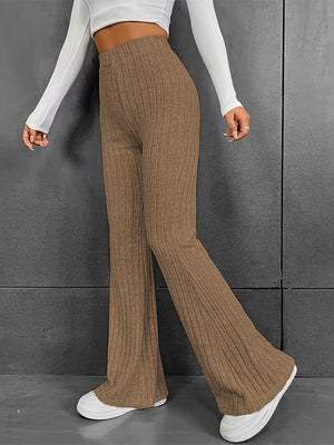 Mocha ribbed flare trousers in 100% polyester with a wide leg and flared hem.