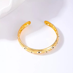 Golden evil eye bangle bracelet with 18K gold plating