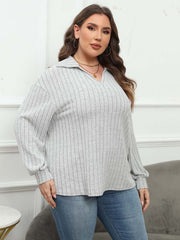 Relaxed ribbed polo top in light grey with a V-neck and long sleeves.