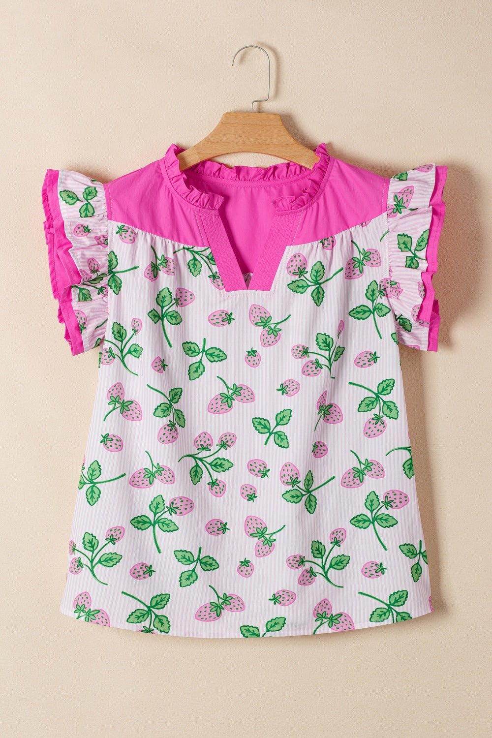 Strawberry print cotton blend blouse with flutter sleeves and pink color block yoke.