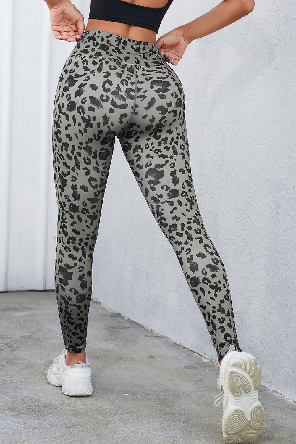 Sculpted leopard print performance leggings in dark gray with a high waist.