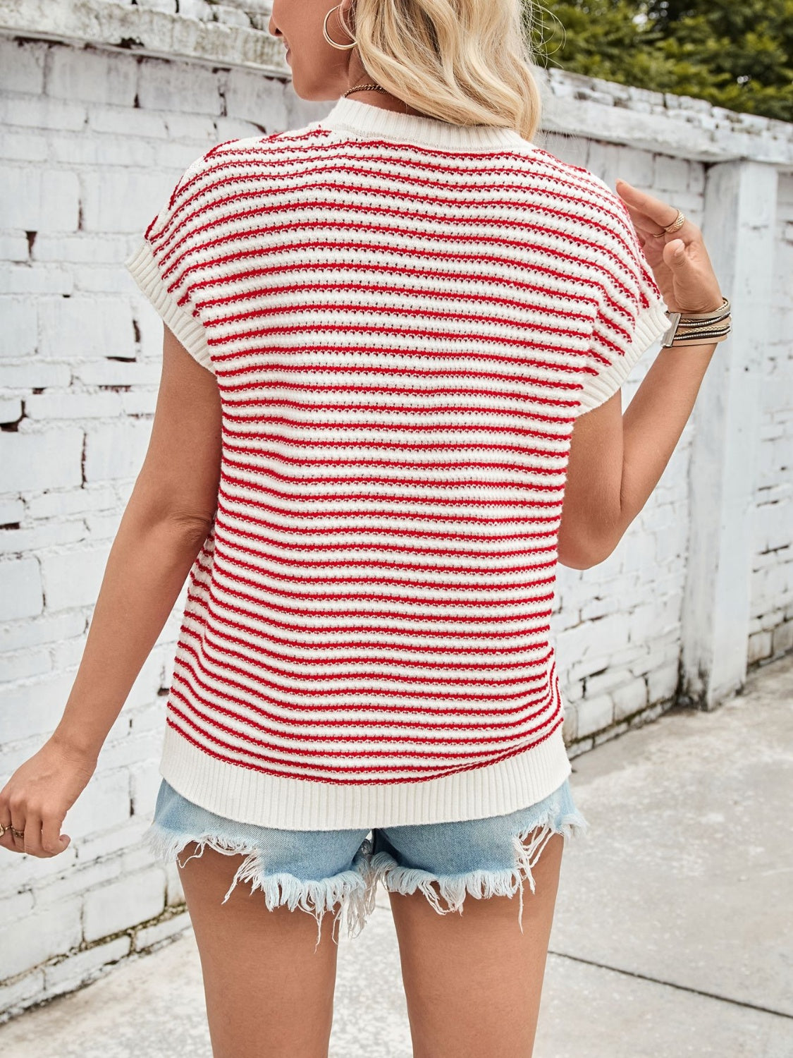 Textured stripe knit top in scarlet and white with cap sleeves.
