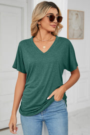 Dark Green V-neck tee with dolman sleeves and ruched side detail.