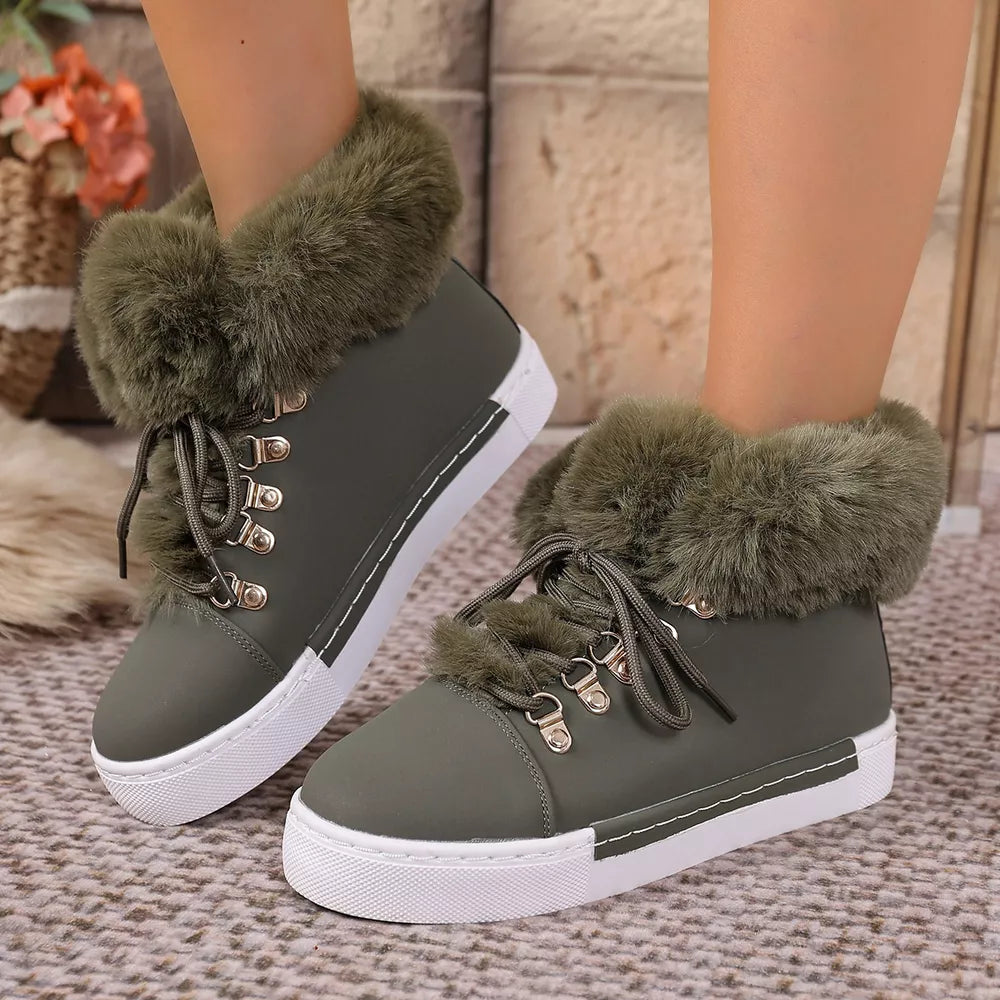 Army green fluffy cuff round-toe platform boots with white soles and laces.