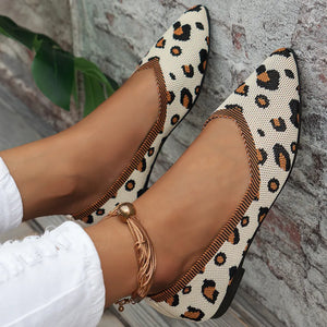 Geometric knit pointed ballet flats in leopard print with a gold anklet.