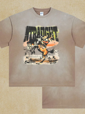Vintage graphic oversized tee in khaki with a cowboy riding a bucking horse and distressed text.