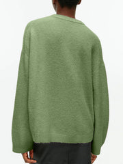 Oversized brushed knit crewneck sweater in Gum Leaf green with ribbed cuffs and hem.