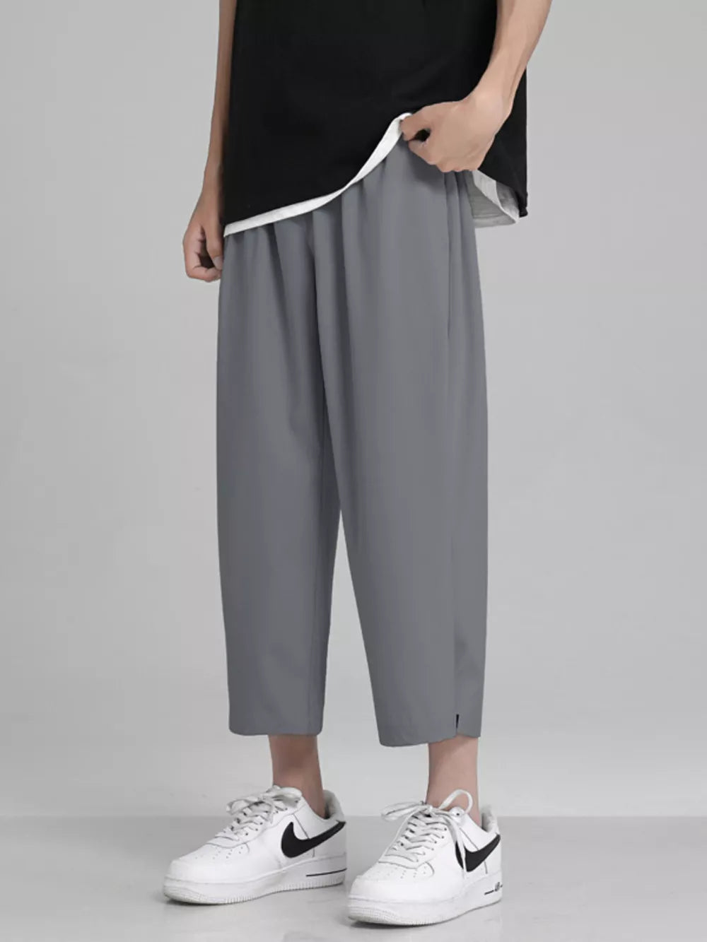 Men's Full Size Loose Fit Cropped Pants in White, model styling view