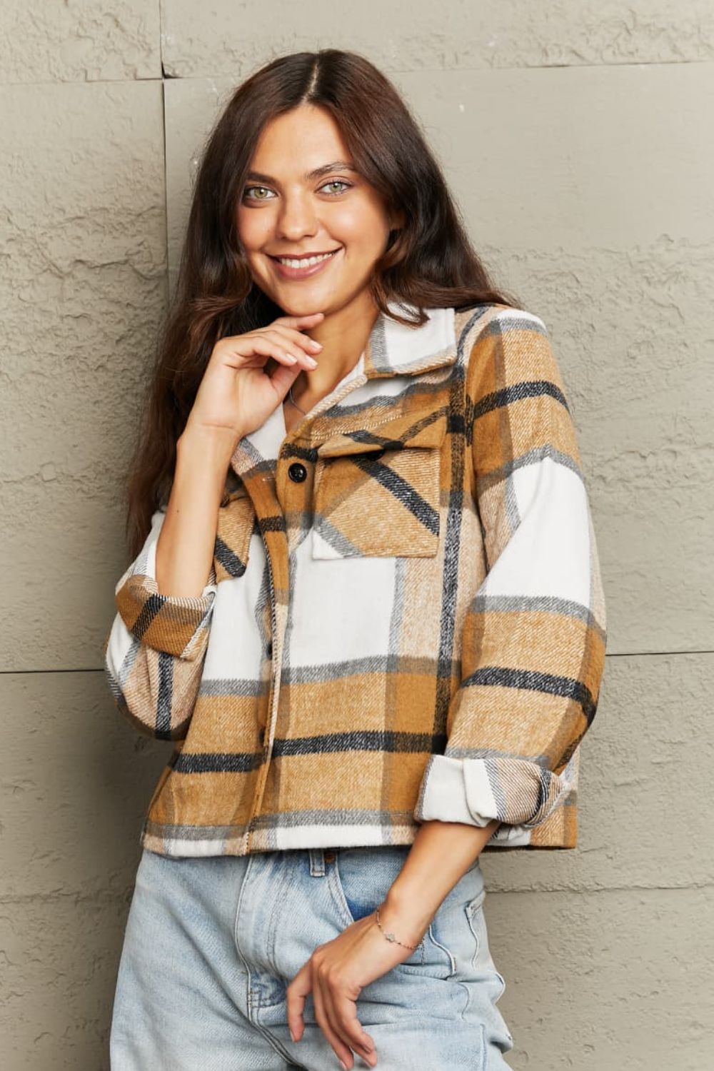 Camel plaid shacket with contrast collar and buttoned chest pockets.