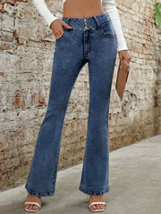 Medium wash cotton bootcut jeans with a sculpted waist and button fly.