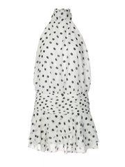 White polka dot halter neck mini dress with ruched waist and ruffled hem