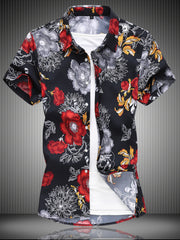 Men's short-sleeve button-up shirt with a bold floral print in red and grey on black.