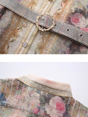 Belted shirt dress with pastel floral print, ornate buckle detail, and button front.