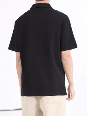 Black short sleeve casual polo shirt with textured fabric.
