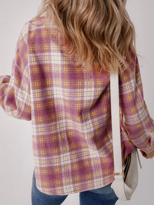 Oversized plaid shacket with pocket in pink, yellow, and white plaid.