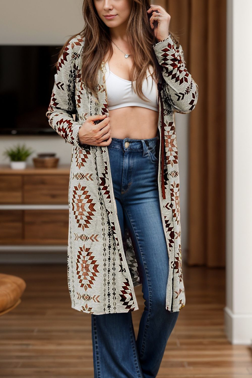 Southwestern print duster cardigan in brown with geometric patterns, open front, long sleeves, and a flowing cut.