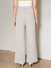 Light grey maternity wide leg pants with self-tie waist detail, shown from the back.