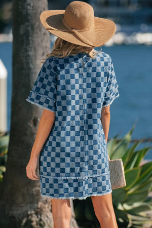 Checkered denim mini dress with frayed hems and short sleeves.