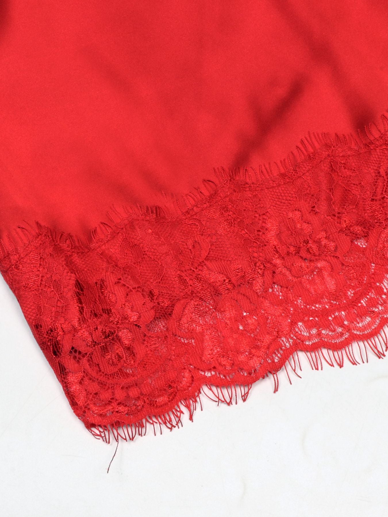 Red satin cami top with delicate lace trim detail