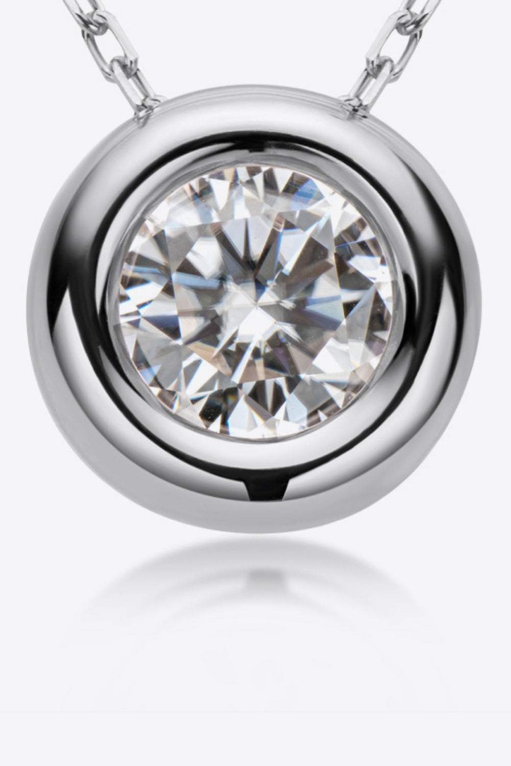 Silver bezel-set moissanite solitaire necklace with a round-cut stone.