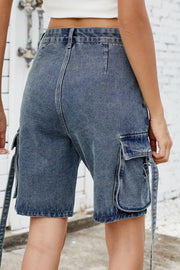 Medium blue denim cargo shorts with straps and flap pockets.