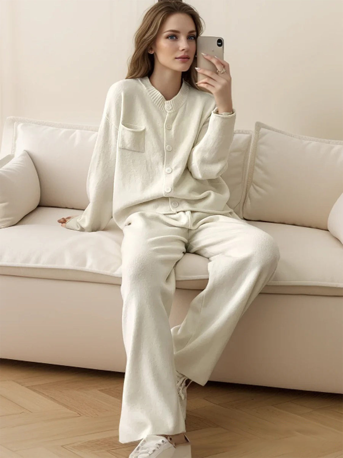 Ribbed knit cardigan and wide leg pants set in white, buttoned closure, crew neck, long sleeves, acrylic material.