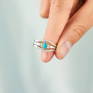 Turquoise chevron stacked ring set in silver with pave details and oval turquoise stone.