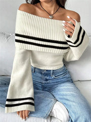 White off-shoulder knit sweater with black stripes and flare sleeves, cropped length