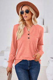 Coral henley neckline jersey top with button detail and long sleeves
