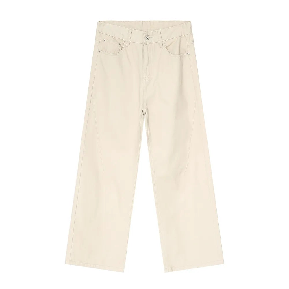 Cream wide-leg denim jeans with angular seam detail and classic five-pocket styling.
