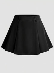 Black mini skirt with defined waist and subtle pleats.
