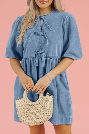 Prairie denim dress in medium with puff sleeves and tie details