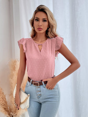 Blush pink dotted swiss keyhole ruffle sleeve blouse with a v-neck.