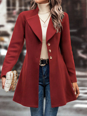 Flared hemline wool coat in deep red with button closure and notched lapel.