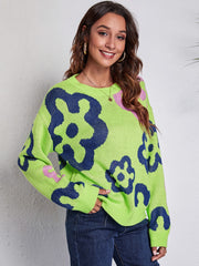Neon floral knit crewneck sweater in light green with navy blue and pink flower pattern.