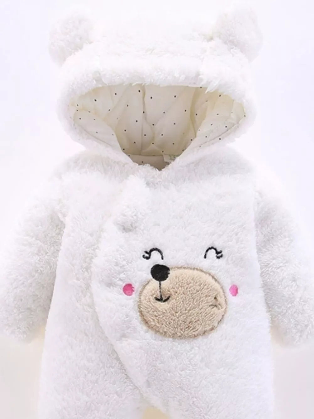 White hooded baby one-piece with bear face and ears detail