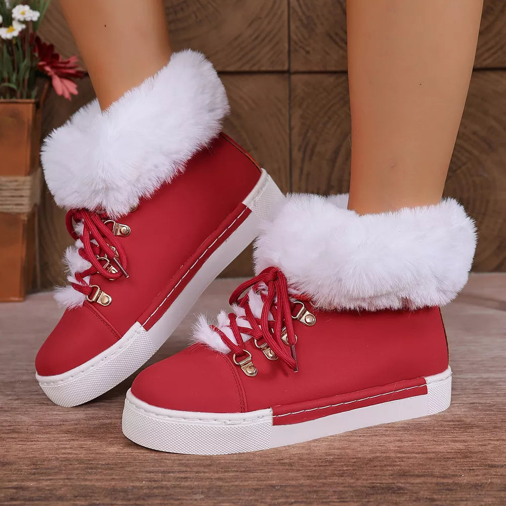 Red fluffy cuff round-toe platform boots with white laces and contrasting sole.