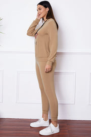 Khaki loungewear set with graphic hoodie and joggers.