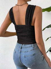 Black textured crinkle strap crop top with ruched bodice and square neckline.