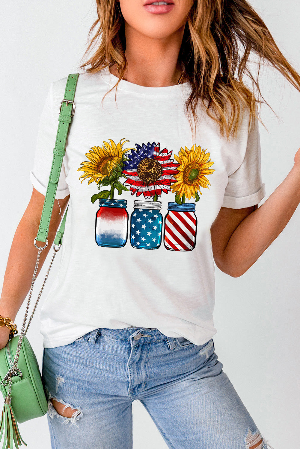 White graphic tee with patriotic sunflowers in mason jars.