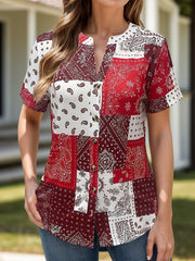Bandana patchwork henley blouse with button front and short sleeves in red and white.