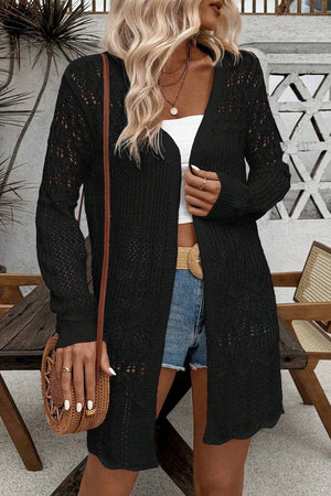 Black openwork crochet duster cardigan with long sleeves and an open front.