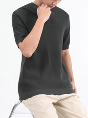 Men's textured knit short sleeve henley in Army Green with a quarter zip neckline.